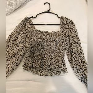 Cheetah boutique top. New with tags. Size small.